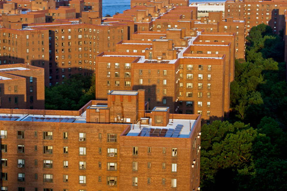 Aerial establishing shot of Stuyvesant Town-Peter Cooper Village on the east side of Manhattan on a sunny evening in summer.
