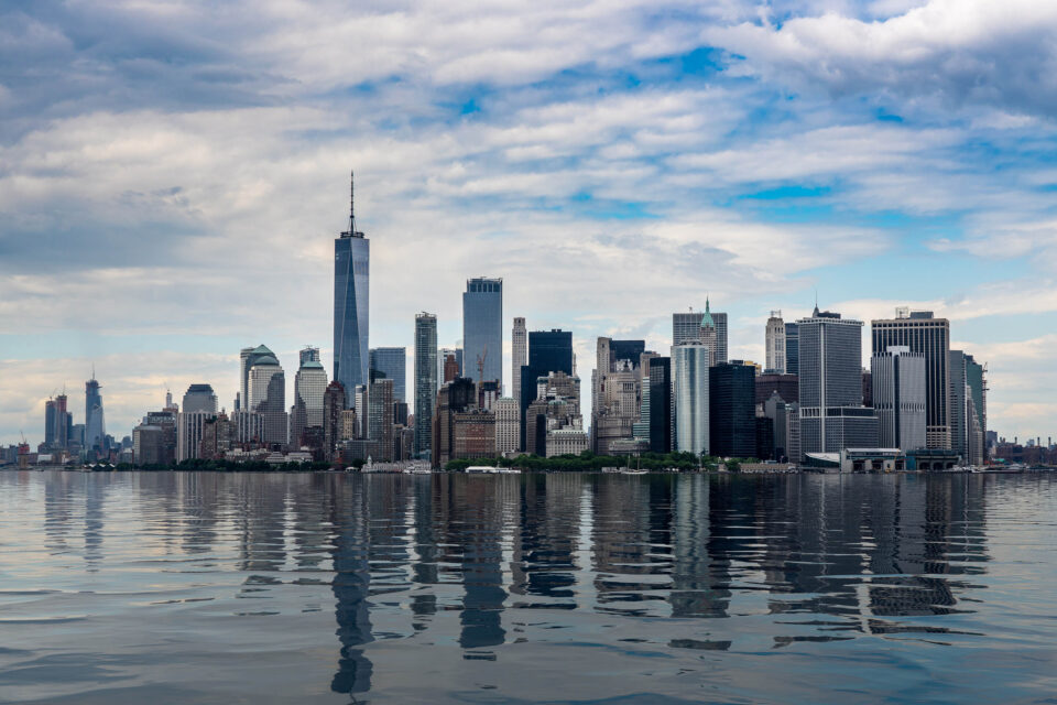 Panorama of Manhattan in New York City with artificial water showing reflections