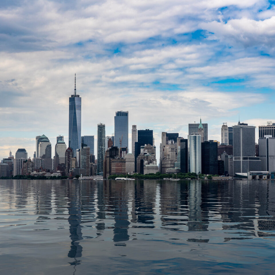 Panorama of Manhattan in New York City with artificial water showing reflections