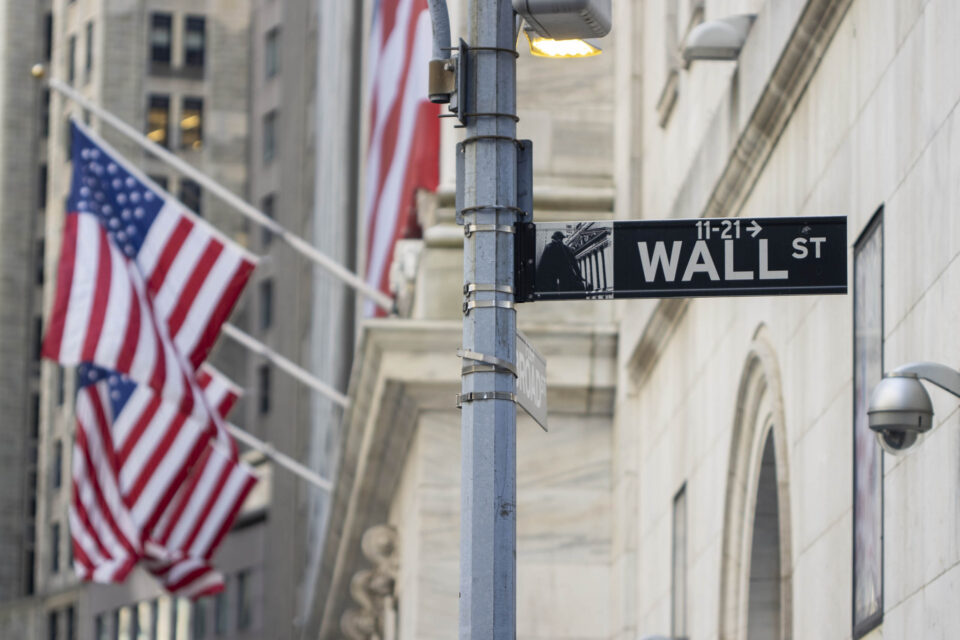 The Wall Street sign in the Financial District of Lower Manhattan in New York City.