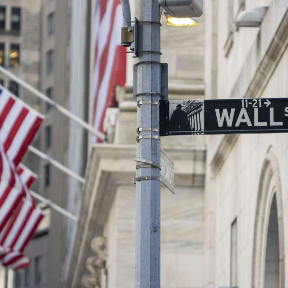 The Wall Street sign in the Financial District of Lower Manhattan in New York City.
