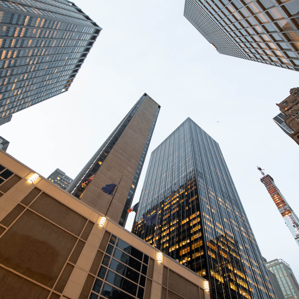 Corporate buidings. Stunning view of skyscraper on 6th Ave, New York, NY USA.